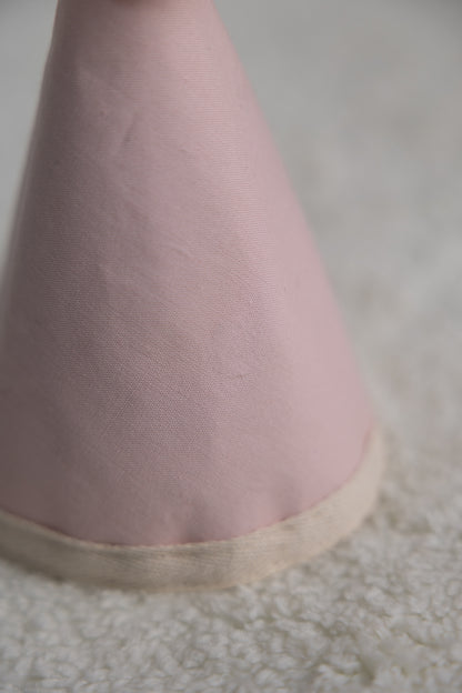 chapeau rose pâle *Imparfait*